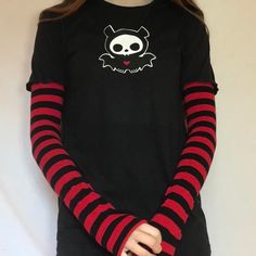 This item is hand printed on a 100% cotton t-shirt with an Acidcore label.  Red & black stripe sleeves sewn into the top with thumb holes & fingerless gives this top grunge goth vibes. The sleeves are available in the following colours: red & black, purple & black, white & black.  About Me:  Acidcore is my store based in London. All my items are hand printed with hand made transfers and some are hand embellished. My designs are inspired by different genres, gothic, emo, grunge, punk, indie, alte Red Cotton Grunge T-shirt, Red Cotton Grunge Top, Black Emo T-shirt For Fall, Red Punk Style Screen Printed Top, Red Edgy Cotton Tops, Edgy Red Cotton Tops, Red Cotton Edgy Tops, Red Cotton Band Merch Top, Emo Style Long Sleeve Cotton T-shirt