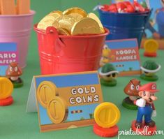 mario birthday party favors with gold coins in buckets