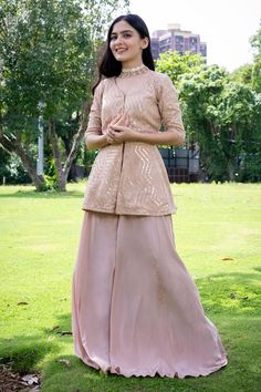 Dusty pink elbow sleeves peplum style kurta with all over chevron flame embroidery using sequins highlights. Paired with a flared gharara. - Aza Fashions Flame Embroidery, Kurta Patterns, Peplum Styles, Sequins Embroidery, Elbow Sleeve, Aza Fashion, Dusty Pink, Types Of Sleeves, Highlights