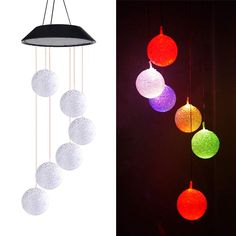 three different types of lights hanging from the ceiling and in front of a black background