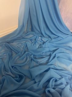 a blue cloth is draped over the floor