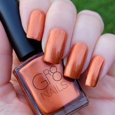 Copper Penny: a beautiful shimmery copper orange nail color. Large 15ml size bottle. Full coverage in 2 coats. For best results always use a base and top coat.  Allow 2-3 minutes dry time between coats All our polish is 10-free, meaning free from 10 of the most common toxins found in the majority of nail polishes on the market. Does not contain: -Formaldehyde (respiratory irritant) -Toluene (nervous system disruptor) -DBP - Dibutyl Phthalate (reproductive/hormonal toxicant) -Camphor (skin/allergy irritant) -Formaldehyde Resin (skin irritant) -Xylene (known allergen/possible carcinogen) -Parabens (linked to breast cancer) -Ethyl Tosylamide (antibacterial/contains toluene) -Triphenyl Phosphate (reproductive/developmental toxicant) -Fragrance (respiratory irritant) Ingredients: Butyl Acetate, Burnt Orange Nail Polish, Orange Nail Color, Copper Nails Designs, Orange Nail Polish, Orange Nail, Fall Nail Art Designs, Copper Penny, Nail Polish Trends