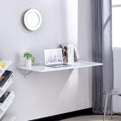 This versatile wall-mounted table offers a space-saving design, perfect for maximizing limited areas. With its sturdy build and sleek look, it fits seamlessly into any room for a variety of uses, from sewing to dining. Easy to install and eco-friendly, it's the ideal solution for modern living. Size: small. Color: White. Addition To Garage, Folding Table Wall, Christmas Gifts Easy, Mounted Folding Table, Laundry Room Folding Table, Wall Mounted Folding Table, Foldable Wall, Decorative Wall Painting, Decorative Wall Shelf