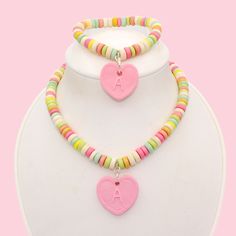 🍭Make it urs! Customize with ur Initial🍭 Buy as a set and save! Remember those awesome candy necklaces you had as a kid? They came on stretchy string and were fun to wear and to eat. I made this jewelry inspired by those edible ones, and they look just like the real thing! But the best part of these is that they last forever. Details & Measurements: Faux Candy Beads in rainbow shades Handmade Powder Pink Faux Candy Heart Pendants Lightweight & comfortable to wear Pendant is 1" or 2.5 cm wide N Candy Necklace Diy, Candy Gems, Candy Accessories, Candy Beads, Candy Necklace, Candy Bracelet, Earrings Kawaii, Pastel Candy, Pink Xmas