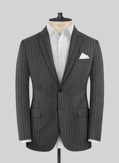 Introducing the Italian Wool Agseni Suit, a sophisticated choice that not only enhances your appearance but also exudes an authoritative presence. Meticulously crafted from the finest pure wool fabric, this exceptional suit showcases a tasteful pattern of evenly spaced vertical stripes, emanating an air of distinction. The subtle gray tone further amplifies its overall charm while its design embodies a refined and understated aesthetic. Whether you find yourself in a formal business meeting, a f Elegant Three-piece Suit With Lapel Collar For Winter, Luxury Pinstripe Outerwear With Notch Lapel, Pinstripe Business Suits With Lapel Collar, Pinstripe Suits With Lapel Collar For Business, Elegant Winter Three-piece Suit With Suit Collar, Elegant Winter Three-piece Suit, Luxury Tailored Pinstripe Outerwear, Luxury Pinstripe Single Breasted Outerwear, Luxury Pinstripe Single-breasted Outerwear