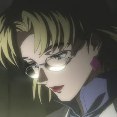 an anime character with glasses staring at something