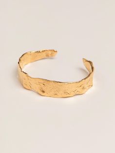 THE LAST SCROLL BRACELET GOLD FEATURES: * Inspired by the birthplace of literature and freedom of thought, The Acropolis of Athens, The Last Scroll bracelet features softly arched, textured parchment. This bangle honors the Acropolis's enduring historic influence, reflecting the foundations of philosophy and democracy. Embrace freedom of expression with this heirloom of antiquity. * Handmade in Vancouver from 24K gold vermeil (which is 3 microns thick of 24K gold plated sterling silver). SIZE + Gold Hammered Bracelets As Gift, Gold Hammered Cuff Bracelet As Gift, Gold Hammered Cuff Bracelet For Gift, Hammered Gold Bangle Bracelet, Hammered Yellow Gold Bracelets As Gift, Hammered Gold Bangle As Gift, Hammered Yellow Gold Bracelets Gift, Unity Ring, Greek Jewellery