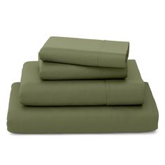 the sheet set in sage green is folded on top of each other