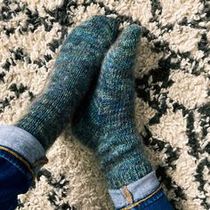 "A super cozy pair of worsted weight socks perfect to keeps those toes warm on cool mornings. MATERIALS 1 skein Red Sock Blue Sock Yarn, Comfort Sock DK (MC) 1 skein Red Sock Blue Sock Yarn, Wistful (CC2) GAUGE 24 sts and 36 rounds = 4\" in St st, after blocking NEEDLES US 5 (3.75 mm) double pointed needles OR 9 inch circulars OR equivalent needles for magic loop FINISHED MEASUREMENTS  Adult Small (Medium, Large) 6.75 (7.25, 8) inches circumference TOOLS Removable stitch markers, tapestry needle SKILL LEVEL Easy ✔ DISCLAIMER: All knitting patterns and crochet patterns are instant-download digital files. No patterns are shipped. Resell finished product with pattern credit. © Ashley Ratnam; All rights reserved" Sock Knitting Pattern, Socks Knitting Pattern, Socks Knitting, Sock Knitting, Blue Socks, Sock Knitting Patterns, Double Pointed Needles, Knitted Slippers, Sock Patterns