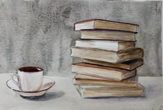 a stack of books next to a cup of coffee