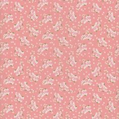 a pink background with small white flowers on it