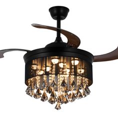 a black ceiling fan with crystal chandelier hanging from it's center blade