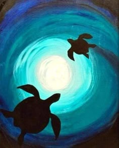 two sea turtles swimming in the ocean at night