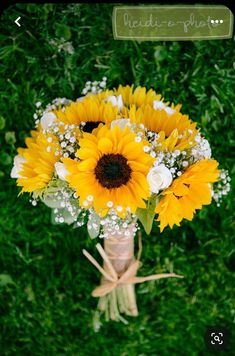 a bouquet of sunflowers and baby's breath