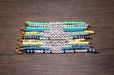 Billie Eilish song title friendship bracelets made with clay, plastic, & beads. Great idea for gifts or for yourself! Bracelets are made to fit the average adult wrist (7 inches). Can be made larger or smaller upon request. Colors can be customized upon request for a small uncharge. See color chart image for additional colors. If you would like another song title or lyrics you can click custom and leave me a note of the details you want.  RETURN POLICY: Because each item is handmade to order, al Billie Eilish Clay Bead Bracelet, Billie Eilish Friendship Bracelet, Billie Eilish Bracelet Ideas, Billie Eilish Bracelet, Billie Concert, Clay Bracelets, Clay Bead Bracelet, Billie Eillish, Marina And The Diamonds