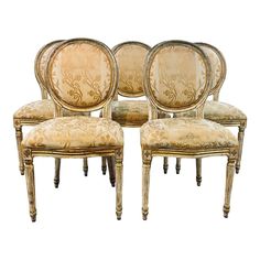 four antique chairs with gold upholstered back and arms, all in the same pattern