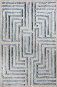 a blue and white rug with squares on it