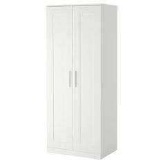 a tall white cabinet with two doors