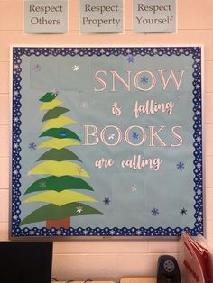 a bulletin board with snow and falling books on it