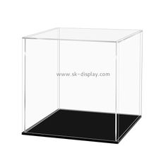 a black and white photo of a glass display case on a white background with the words,