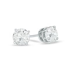 Precious, delicate 14K white gold prongs hold twinkling diamonds that sparkle like stars in these diamond solitaire stud earrings. Totaling 1-1/2 cts., the two diamonds reflect their wearer's refined, sophisticated elegance. These earrings secure with screwbacks. Earrings White Gold, White Gold Diamond Earrings, White Gold Earrings Studs, Solitaire Studs, Local Jewelry, Earrings Accessories, Gold Diamond Earrings, Gold Diamond Jewelry, White Gold Earrings