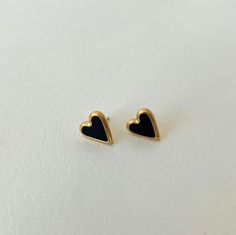 These earrings are 18k gold plated stainless steel stud earrings. Gold Heart Stud Earrings, Gold Heart Studs, Gold Heart Earring, Black Stud Earrings, Heart Earring, Black Stud, Earring Stud, Heart Stud Earrings, Jewelry Lookbook