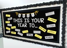 this is your year to bulletin board with sticky notes on blackboard and white background