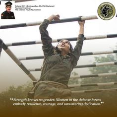 a woman in uniform is climbing up on a metal structure with her hands above the bars