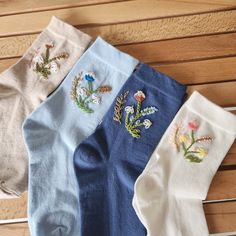 Vibrant colors and delicate floral embroidery make these socks truly unique and eye-catching. Take your style to the next level with these colorful embroidered patterned women's socks. Pamper yourself with the uniqueness of these special socks and add elegance to every outfit.    Add elegance to your style with these colorful patterned socks designed specifically for women and decorated with special embroidery details.    Each sock features a charming floral pattern that adds elegance and elegan Embroidering Socks, Hand Embroidered Socks, Sock Embroidery Ideas, Embroider Socks, Embroidery On Socks, Beaded Socks, Sock Embroidery, Spring Socks, Socks Embroidery