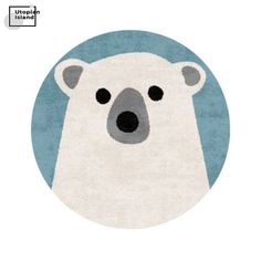 a polar bear rug in the shape of a circle on a white background with blue border