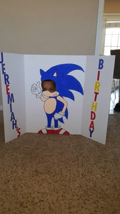 an image of a birthday card with sonic the hedgehog on it's side