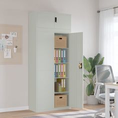 a room with a desk, chair and bookcase in it's center area