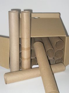 several rolls of toilet paper in a cardboard box