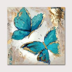 two blue butterflies on a white and gold background, one is painted with acrylic paint