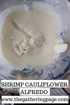 shrimp cauliflower alfredo in a blender with text overlay that reads shrimp cauliflower alfredo