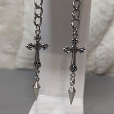 Cross Charm Earrings With Chain And Silver Spike Comes On Stainless Steel Fish Hook Earrings. #Cross #Silver #Crosses #Earrings #Gothic Earrings Silver Dangle, Goth Cross Earrings, Silver Spike Earrings, Upside Down Cross Earrings, Silver Gothic Jewelry, Cybersigilism Jewelry, Grunge Jewelry Earrings, Spikes Aesthetic, Silver Jewelry Aesthetic