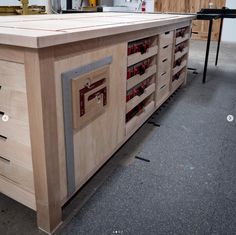 a workbench made out of plywood and wood