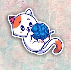 an orange and white cat playing with a ball of yarn sticker on a wall