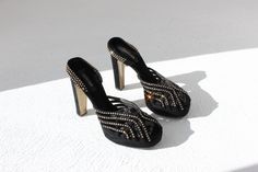 * 2000s Roberto Cavalli disco platforms * Designer quality shoe, made in Italy  * Black velvet covered in twinkling rhinestones (no filter needed, these babies sparkle!) * Open toe, cut out cage design * Slingback * Wear at soles but exterior presents beautifully SIZING: Marked a 40 but fit like a 39 Euro 39 / AU 8 / UK 6 / US 9 MEASUREMENTS: Insole toe to heel: 26cm // Sole at widest: 8cm // Heel: 13.5cm Disco Party, Roberto Cavalli, Platform Heels, Women's Pumps, Womens Heels, Pump Shoes, Open Toe, Shoes Women Heels, Shoes Heels