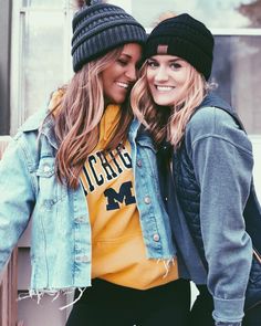 two young women standing next to each other