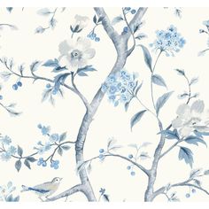 a blue and white floral wallpaper with birds on the branches, flowers and leaves