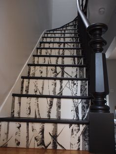 the stairs are painted with black and white designs