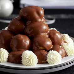 a white plate topped with chocolate covered candies