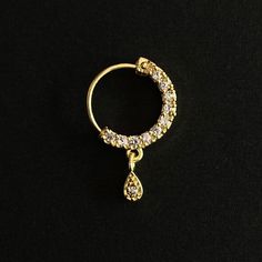 Name of Product: Bridal Traditional Jewelry Indian Antique Nose Ring. It requires a hole in the nose ( piercing is required ) Unfortunately no exchanges /refunds due to hygiene reasons Diameter: 1.3/1.5/1.8/2.4 Centimeter Platting: Gold Material: Copper Piercing: Left Side To view our latest collection of Nose rings / Nath please click the below link. https://www.etsy.com/uk/shop/HemrajJewellers?ref=seller-platform-mcnav§ion_id=30100702 Jewelry care instructions : 1. Please wipe the jewelry with Desi Nose Ring Aesthetic, Latest Gold Nath Designs For Bride, Indian Nose Ring Hoop, Gold Nose Jewelry, Gold Nath, Bridal Nath, Nose Ring Designs, Nose Ring Indian, Nose Ring Gold