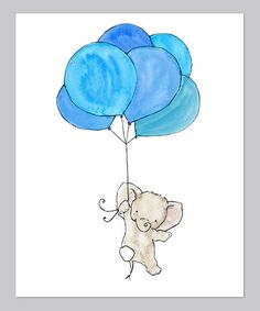 an elephant holding onto some blue balloons