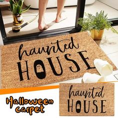 a door mat with the words haunted house on it and a person standing in front