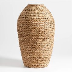 a large vase made out of wicker on a white background