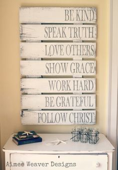 a white dresser topped with a sign that says be kind of speak truth love others show grace work hard be grateful follow christ