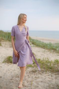 Custom orders and items purchased during major sales cannot be returned or exchanged. Lilac wedding guest dress. Minimalist, elegant and stylish green wrap dress is the perfect choice for summer. Style this lovely linen dress with heels if you are wearing it as a bridesmaid dress, wedding guest dress or as a cocktail party dress. Wear with flats for work, for more casual occasions or for a romantic walk in the city. This dress is knee length. It features V-neckline and deep side pockets. A-line Wrap Dress Summer, Romantic Walk, Elegant Wrap Dress, Green Wrap Dress, Dress Minimalist, Lilac Wedding, Tea Party Dress, Green Wrap, Style Finder