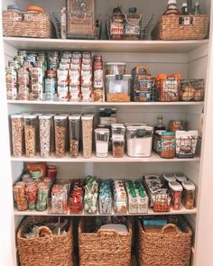 an organized pantry with baskets and food items